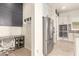 Kitchen workspace with desk and built-in shelving at 18346 W Coolidge St, Goodyear, AZ 85395