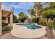 Inviting kidney-shaped pool with a water feature in a landscaped backyard at 1882 W Canary Way, Chandler, AZ 85286