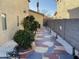 Landscaped backyard with a patterned concrete patio at 2049 N Arbor Ln, Chandler, AZ 85225