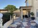 Covered patio and landscaped backyard with decorative statues at 2049 N Arbor Ln, Chandler, AZ 85225