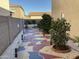 Landscaped backyard with a patterned concrete patio at 2049 N Arbor Ln, Chandler, AZ 85225