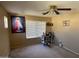 Bright bedroom with window coverings and decorative wall art at 2049 N Arbor Ln, Chandler, AZ 85225