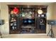 Built-in entertainment center with ample storage at 2049 N Arbor Ln, Chandler, AZ 85225