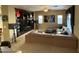 Living room boasts a built-in entertainment center and sectional sofa at 2049 N Arbor Ln, Chandler, AZ 85225