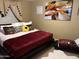 Spacious main bedroom with a large bed and stylish decor at 2049 N Arbor Ln, Chandler, AZ 85225