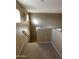 Upper level landing with carpeted floors and stairs at 2049 N Arbor Ln, Chandler, AZ 85225