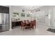 Charming dining area with a wood table and built in cabinetry at 20771 W Windsor Blvd, Buckeye, AZ 85396