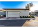 Attached garage with light beige exterior at 20771 W Windsor Blvd, Buckeye, AZ 85396