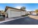 Attached garage with light beige exterior at 20771 W Windsor Blvd, Buckeye, AZ 85396