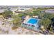 Community pool with lounge chairs and shaded areas at 20771 W Windsor Blvd, Buckeye, AZ 85396