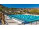 Resort-style pool with a ramp and plenty of lounge space at 20771 W Windsor Blvd, Buckeye, AZ 85396