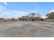 Large backyard with a view of the house and surrounding landscape at 20918 E Orchard Ln, Queen Creek, AZ 85142