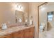 Light and bright bathroom with single vanity at 20918 E Orchard Ln, Queen Creek, AZ 85142