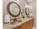 Copper sinks and tile countertops in a shared bathroom at 20918 E Orchard Ln, Queen Creek, AZ 85142