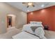 Large bedroom with king bed and access to walk-in closet at 20918 E Orchard Ln, Queen Creek, AZ 85142