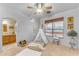 bedroom with teepee and ample natural light at 20918 E Orchard Ln, Queen Creek, AZ 85142