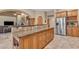 Kitchen with island and breakfast bar, granite countertops at 20918 E Orchard Ln, Queen Creek, AZ 85142
