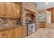 Spacious kitchen with granite countertops and stainless steel appliances at 20918 E Orchard Ln, Queen Creek, AZ 85142