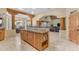 Kitchen with island and breakfast bar, granite countertops at 20918 E Orchard Ln, Queen Creek, AZ 85142