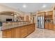 Island kitchen with granite counters and ample cabinet space at 20918 E Orchard Ln, Queen Creek, AZ 85142