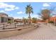 Landscaped backyard with a curved walkway and stone accents at 2106 W Ian Dr, Phoenix, AZ 85041