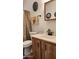 Bathroom with wood vanity and updated fixtures at 2233 E Behrend Dr # 197, Phoenix, AZ 85024