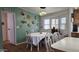 Bright dining area with bay window and decorative wall at 2233 E Behrend Dr # 197, Phoenix, AZ 85024