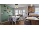 Charming dining area with bay window and decorative wall at 2233 E Behrend Dr # 197, Phoenix, AZ 85024