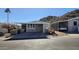 Mobile home exterior with carport and mountain views at 2233 E Behrend Dr # 197, Phoenix, AZ 85024