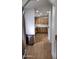 Kitchen with wood cabinets, stainless steel appliances and laundry area at 2233 E Behrend Dr # 197, Phoenix, AZ 85024