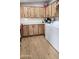 Laundry area with washer, dryer, and ample cabinet space at 2233 E Behrend Dr # 197, Phoenix, AZ 85024