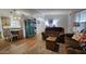 Open concept living room with kitchen and charming decor at 2233 E Behrend Dr # 197, Phoenix, AZ 85024