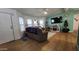 Spacious living room with laminate floors and a fireplace at 2233 E Behrend Dr # 197, Phoenix, AZ 85024
