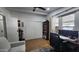 Home office with a comfortable seating area and built-in shelves at 2233 E Behrend Dr # 197, Phoenix, AZ 85024