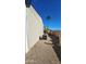 Side of mobile home with AC unit and gravel at 2233 E Behrend Dr # 197, Phoenix, AZ 85024