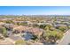 Two-story house with a three-car garage and solar panels at 2415 W Desperado Way, Phoenix, AZ 85085