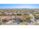 Two-story house with a three-car garage and solar panels at 2415 W Desperado Way, Phoenix, AZ 85085