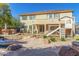 Large backyard with playset, pool, and patio area at 2415 W Desperado Way, Phoenix, AZ 85085