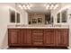 Double vanity bathroom with wood cabinets at 2415 W Desperado Way, Phoenix, AZ 85085