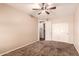 Bedroom with ceiling fan and double doors at 2415 W Desperado Way, Phoenix, AZ 85085