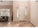 Home entry with tiled floor and view of living room at 2415 W Desperado Way, Phoenix, AZ 85085