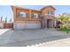 Two-story house with three-car garage and front yard at 2415 W Desperado Way, Phoenix, AZ 85085