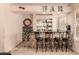 Elegant home bar with wine storage and seating for four at 2415 W Desperado Way, Phoenix, AZ 85085