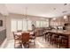 Kitchen boasts granite island, breakfast nook, and ample cabinetry at 2415 W Desperado Way, Phoenix, AZ 85085