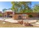 Outdoor kitchen with grill, bar seating, and gazebo at 2415 W Desperado Way, Phoenix, AZ 85085