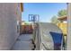 Covered patio area with storage shed and basketball court at 2415 W Desperado Way, Phoenix, AZ 85085