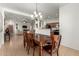 Open dining room with a view of the living room and kitchen at 28452 N Crimm Rd, San Tan Valley, AZ 85143