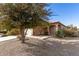 One story house with tan exterior, walkway, and desert landscaping at 28452 N Crimm Rd, San Tan Valley, AZ 85143