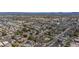 Expansive aerial view of a residential area featuring single-Gathering homes and well-maintained landscaping at 3024 E Siesta Ln, Phoenix, AZ 85050