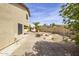 Outdoor retreat with a fire pit and a decorative water feature at 3024 E Siesta Ln, Phoenix, AZ 85050